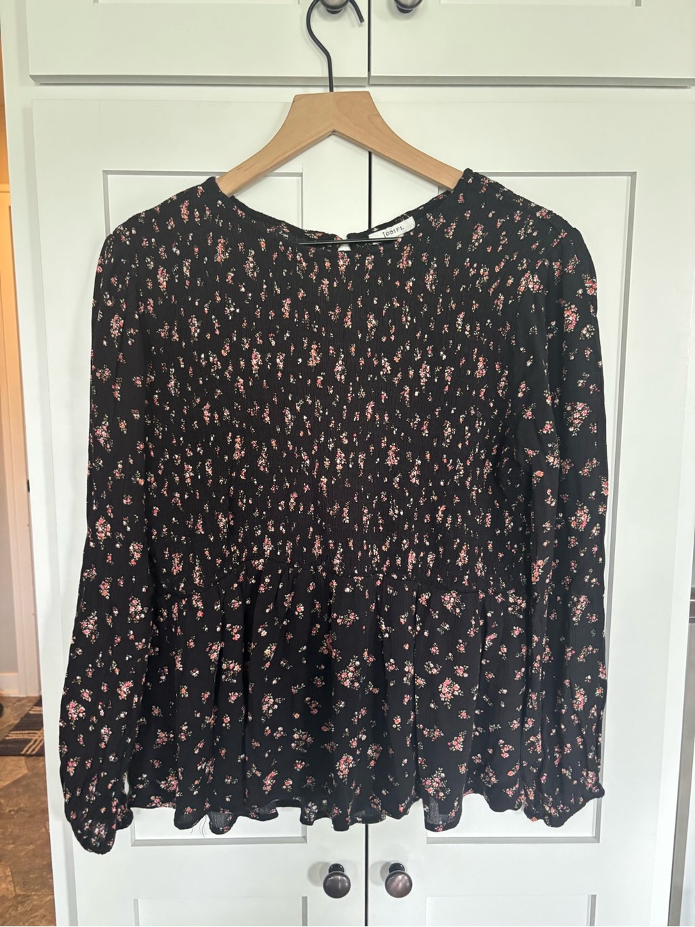 JODIFL Black Blouse with Pink Floral Smocked Peplum